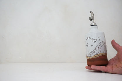 E Teton Dipper Stars Olive Oil Pour in White