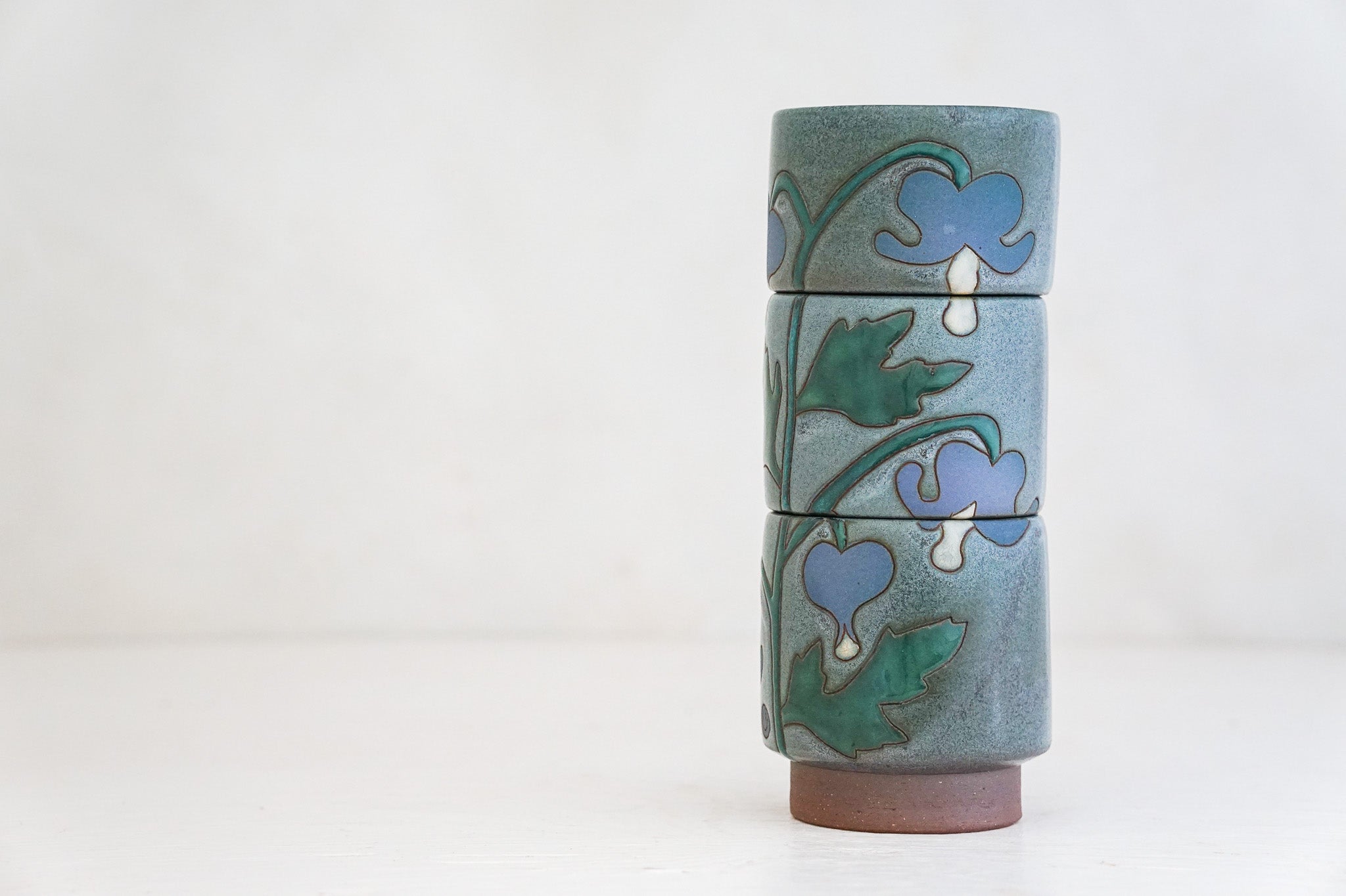 Purple Bleeding Heart Stacker cups in Stone glaze
