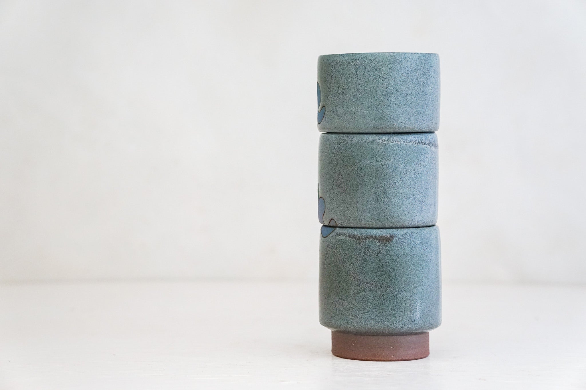 Purple Bleeding Heart Stacker cups in Stone glaze