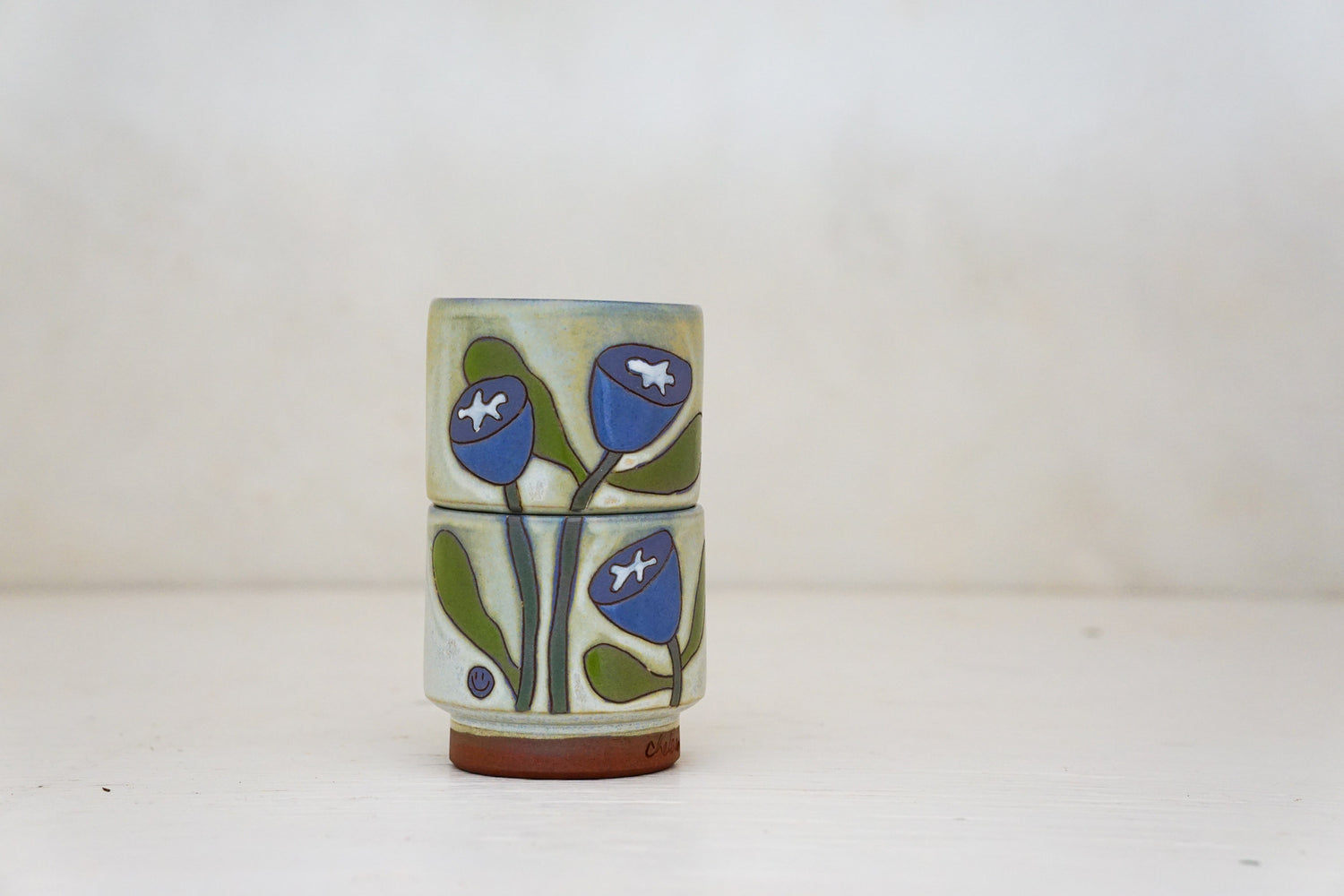 Happy Purple Flower Stacker cups in Bone