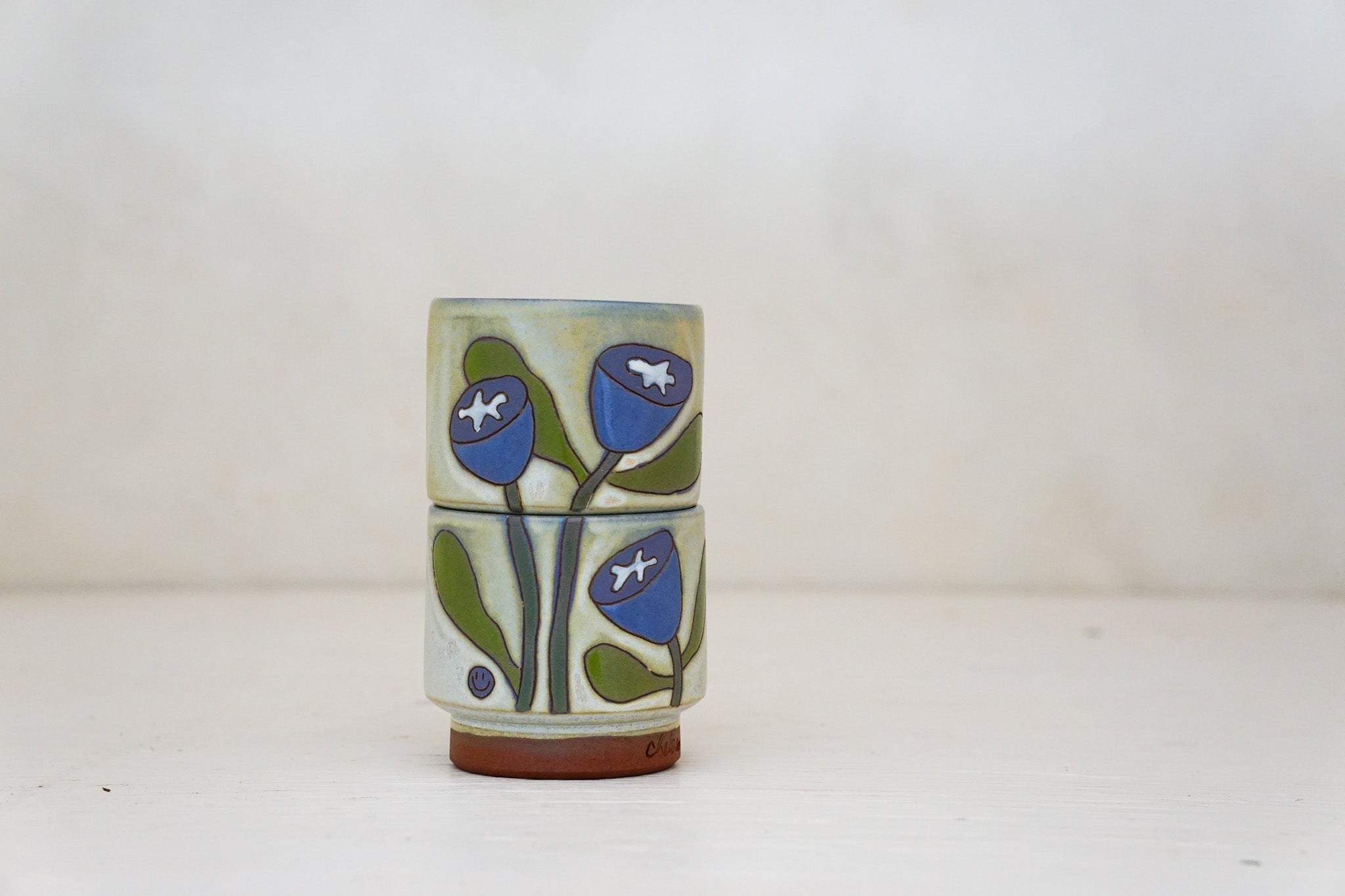 Happy Purple Flower Stacker cups in Bone