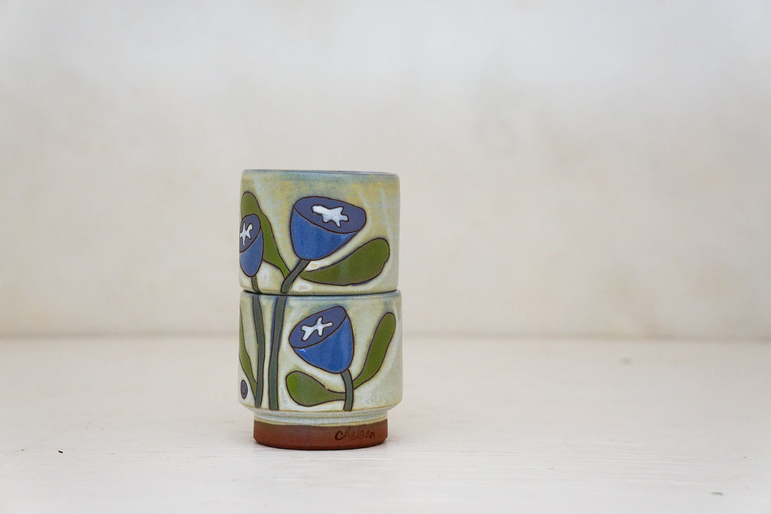 Happy Purple Flower Stacker cups in Bone