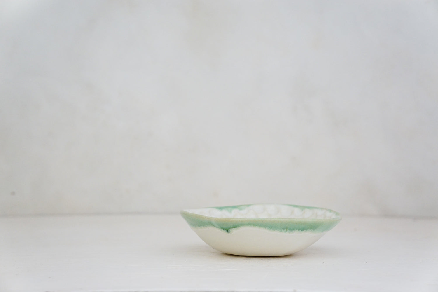 Handbuilt Thumbprint bowl in White