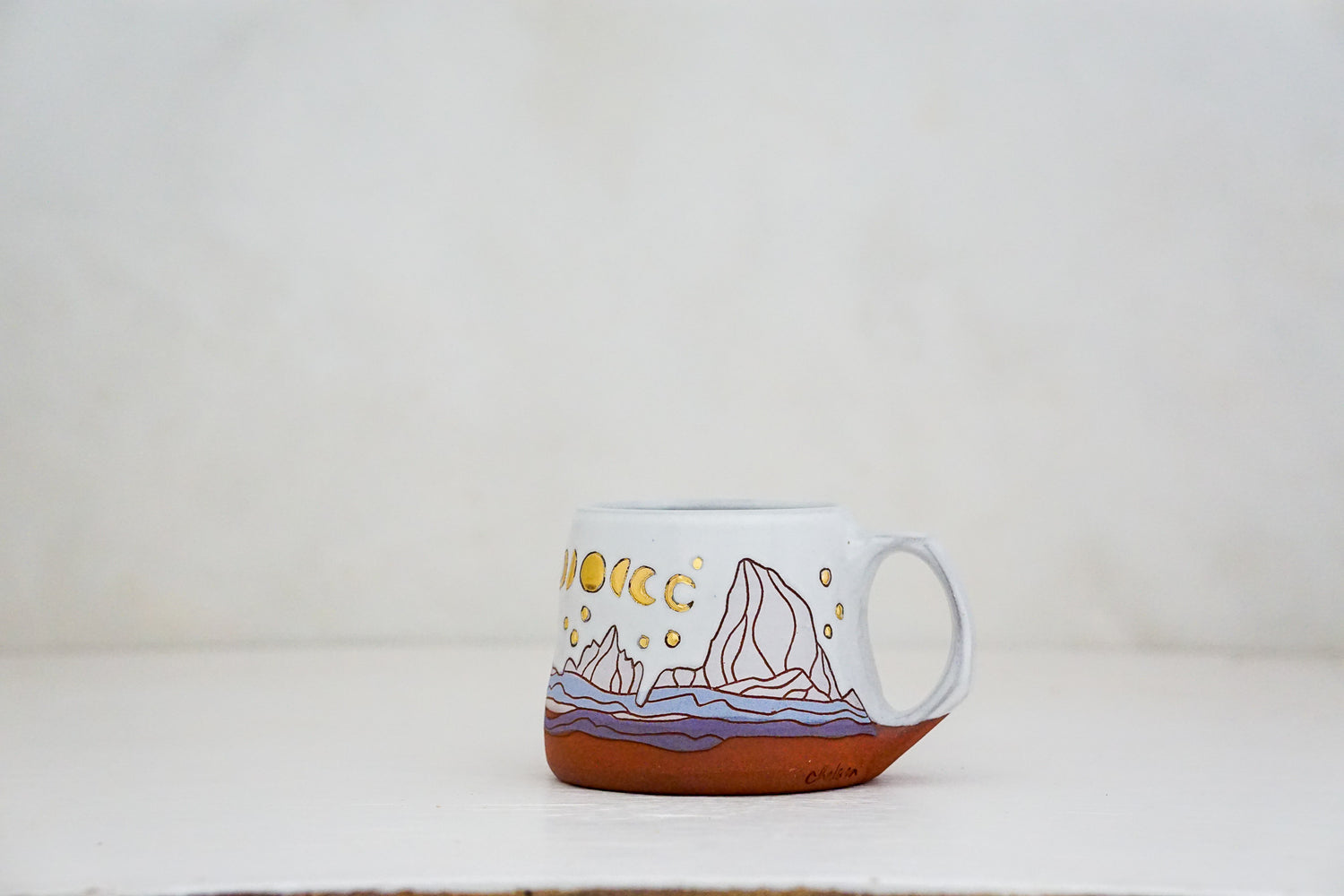 GOLD W Teton Moon phase mug