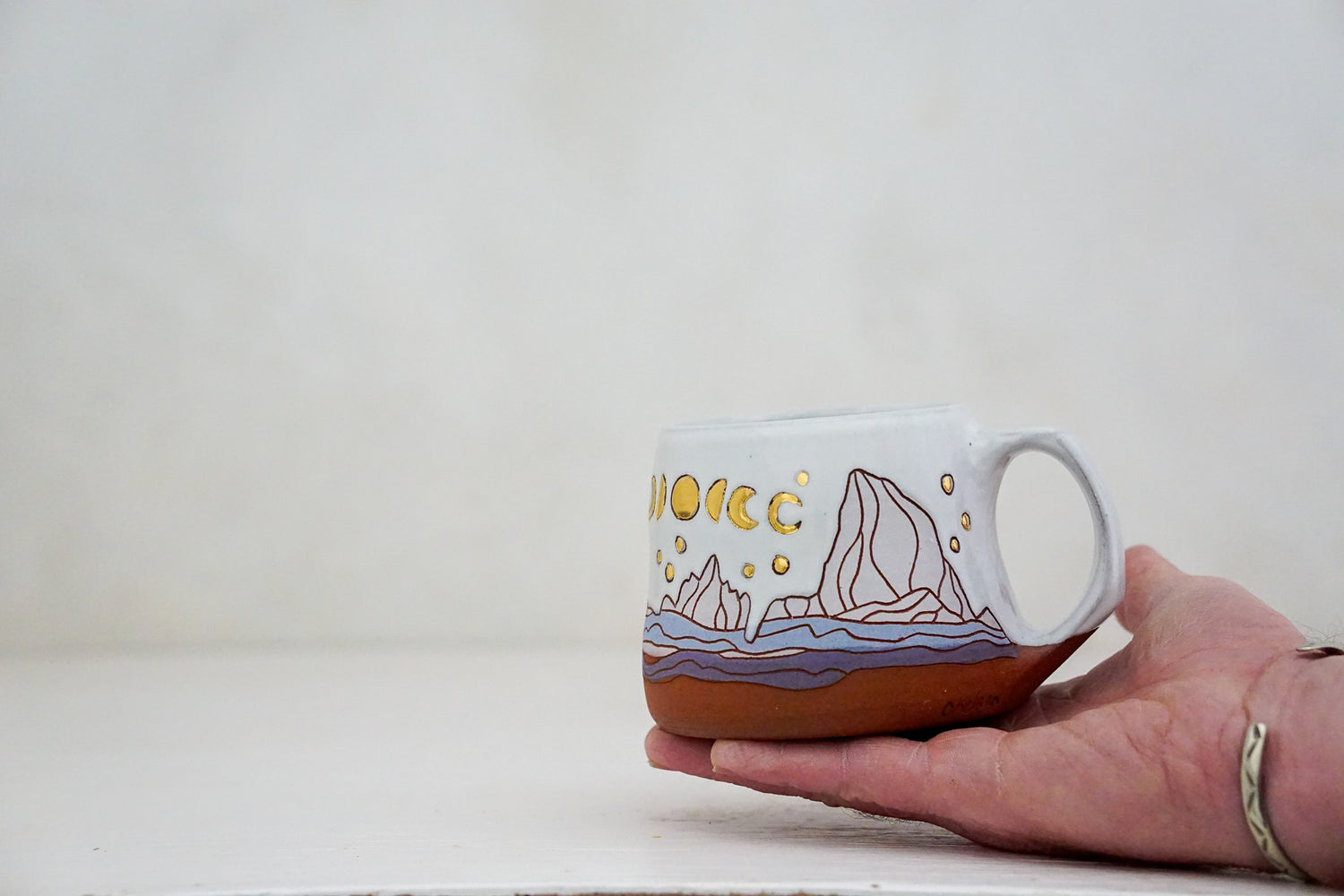 GOLD W Teton Moon phase mug