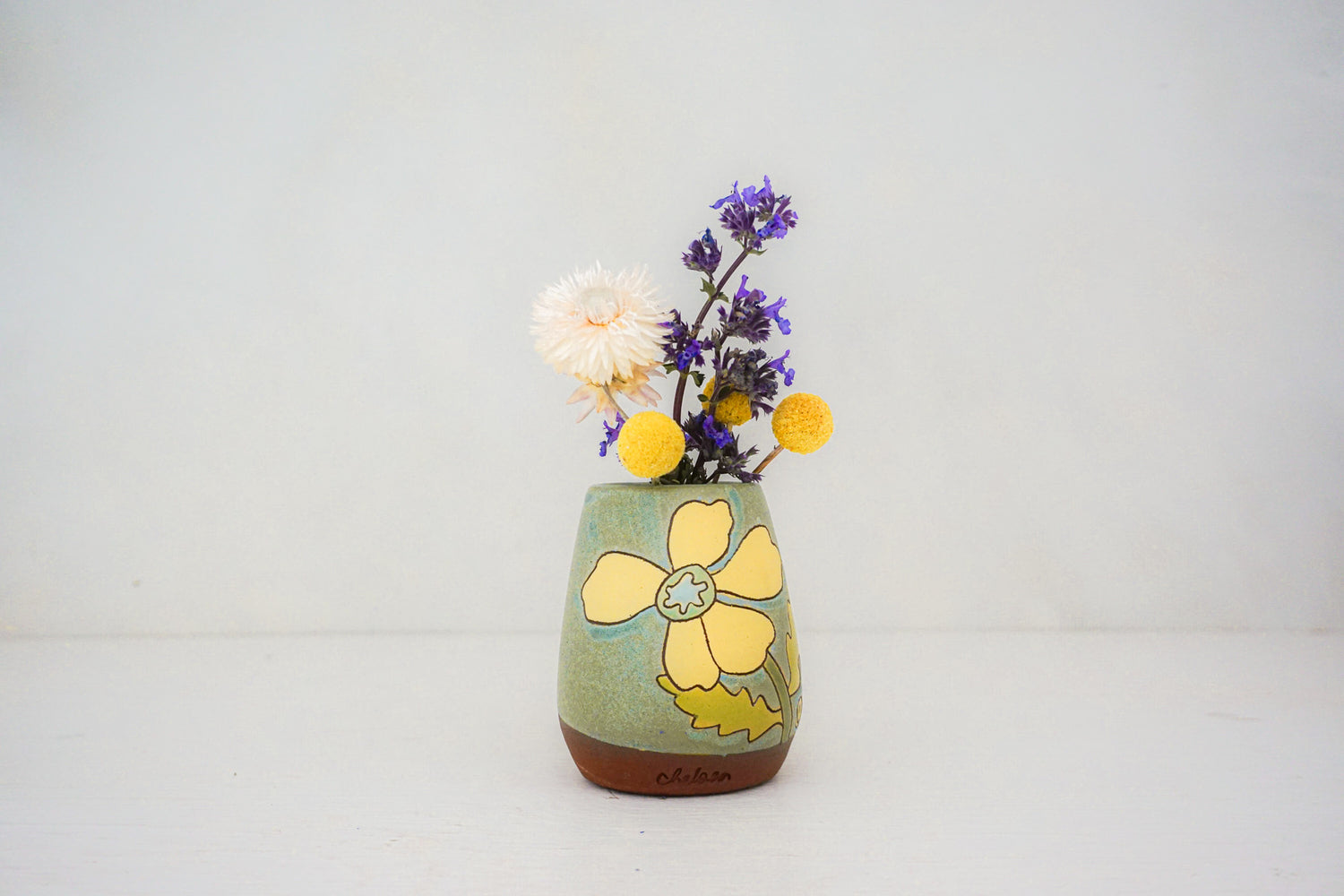 Yellow flower vase in LAKE