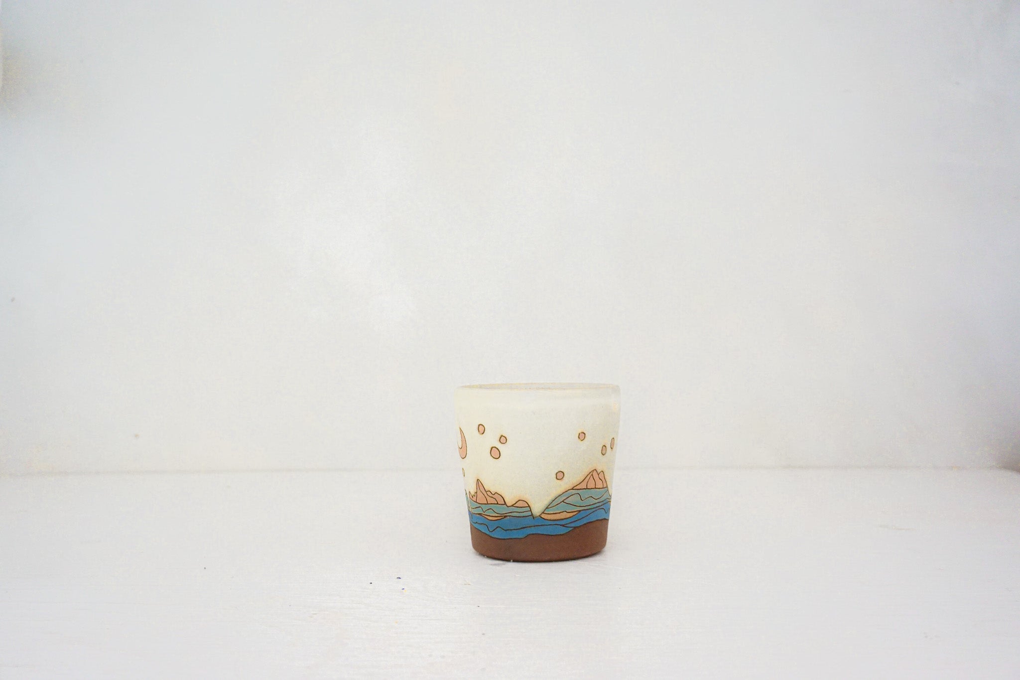 E Teton stars cup in BONE