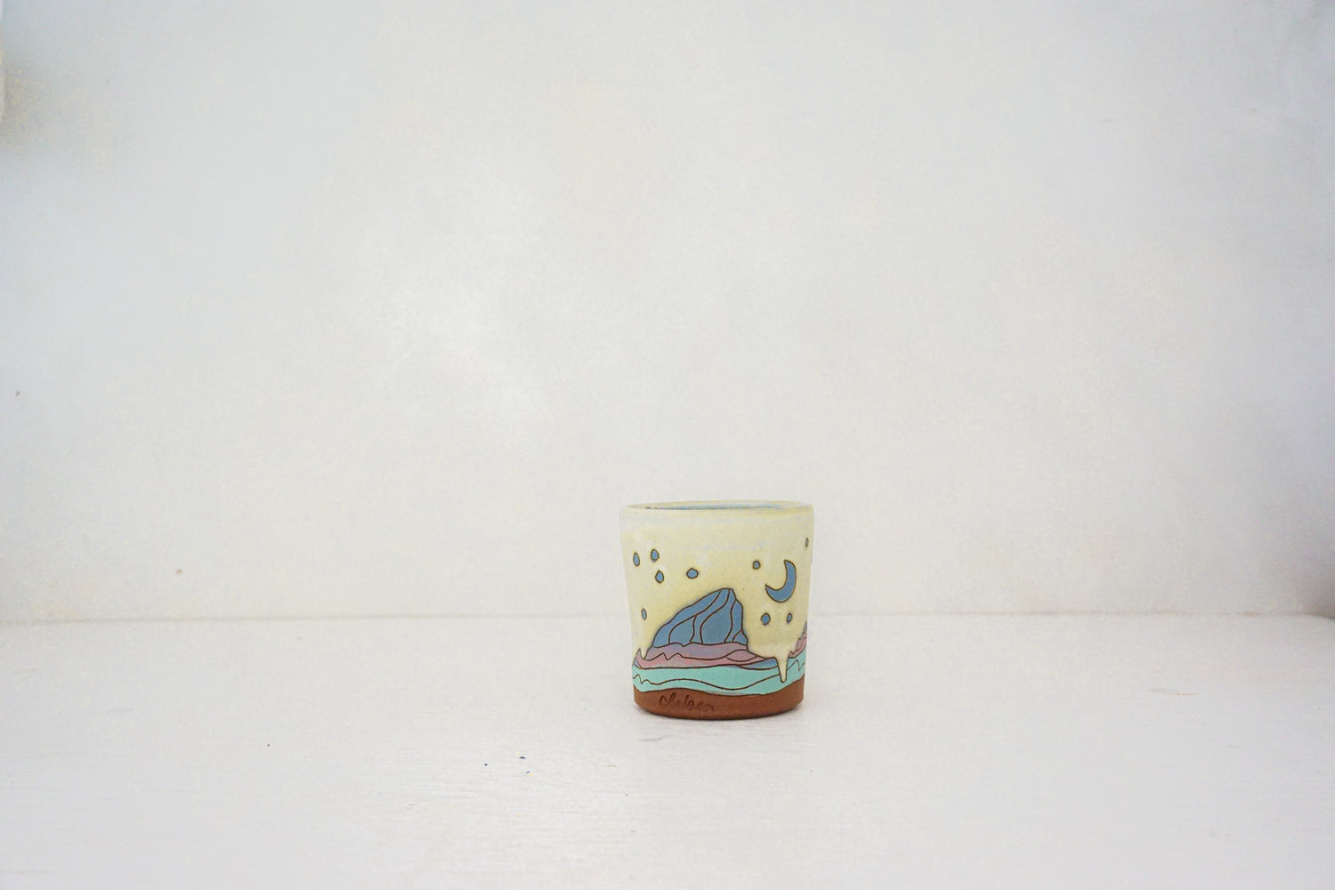 E Teton stars blue cup in BONE
