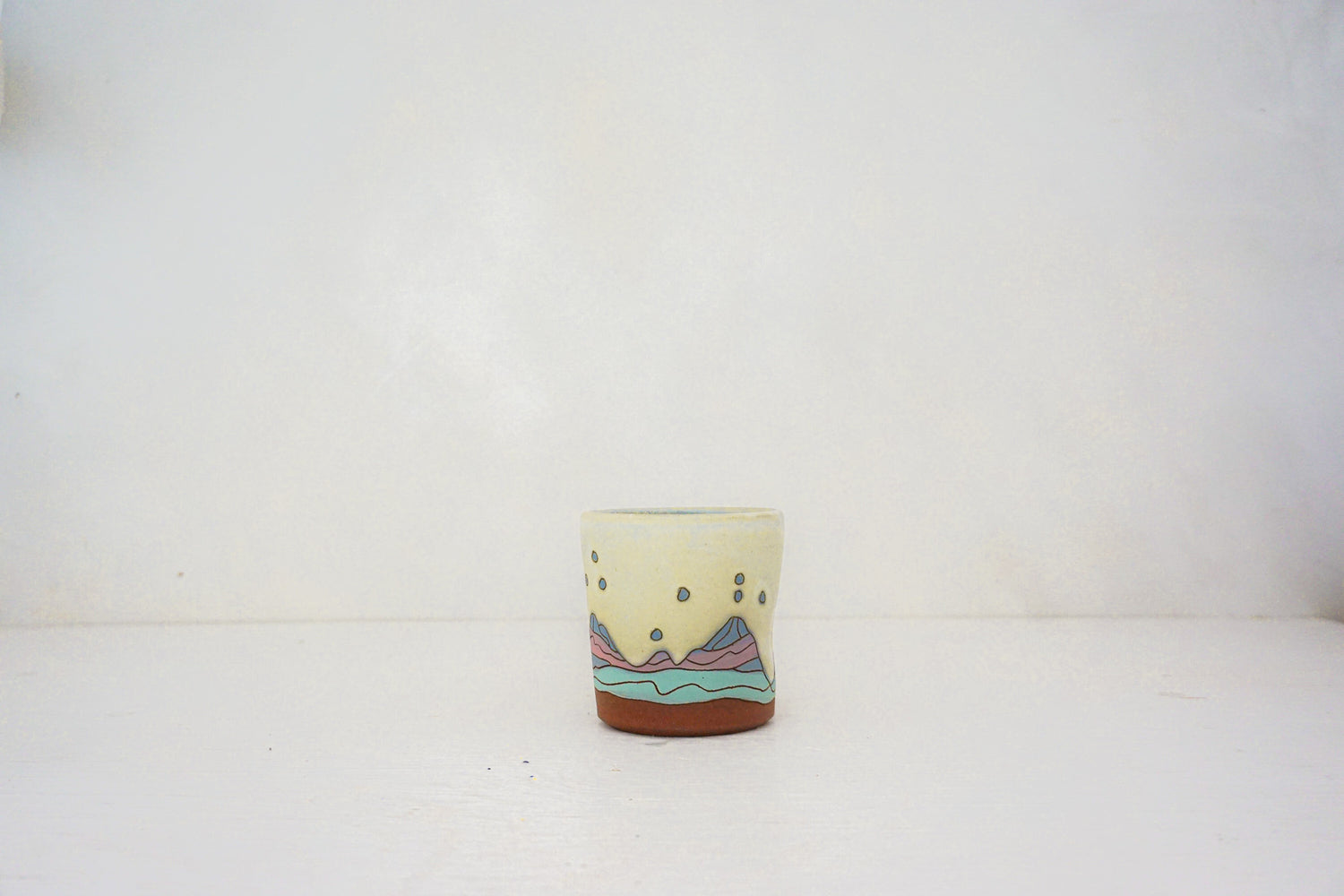 E Teton stars blue cup in BONE