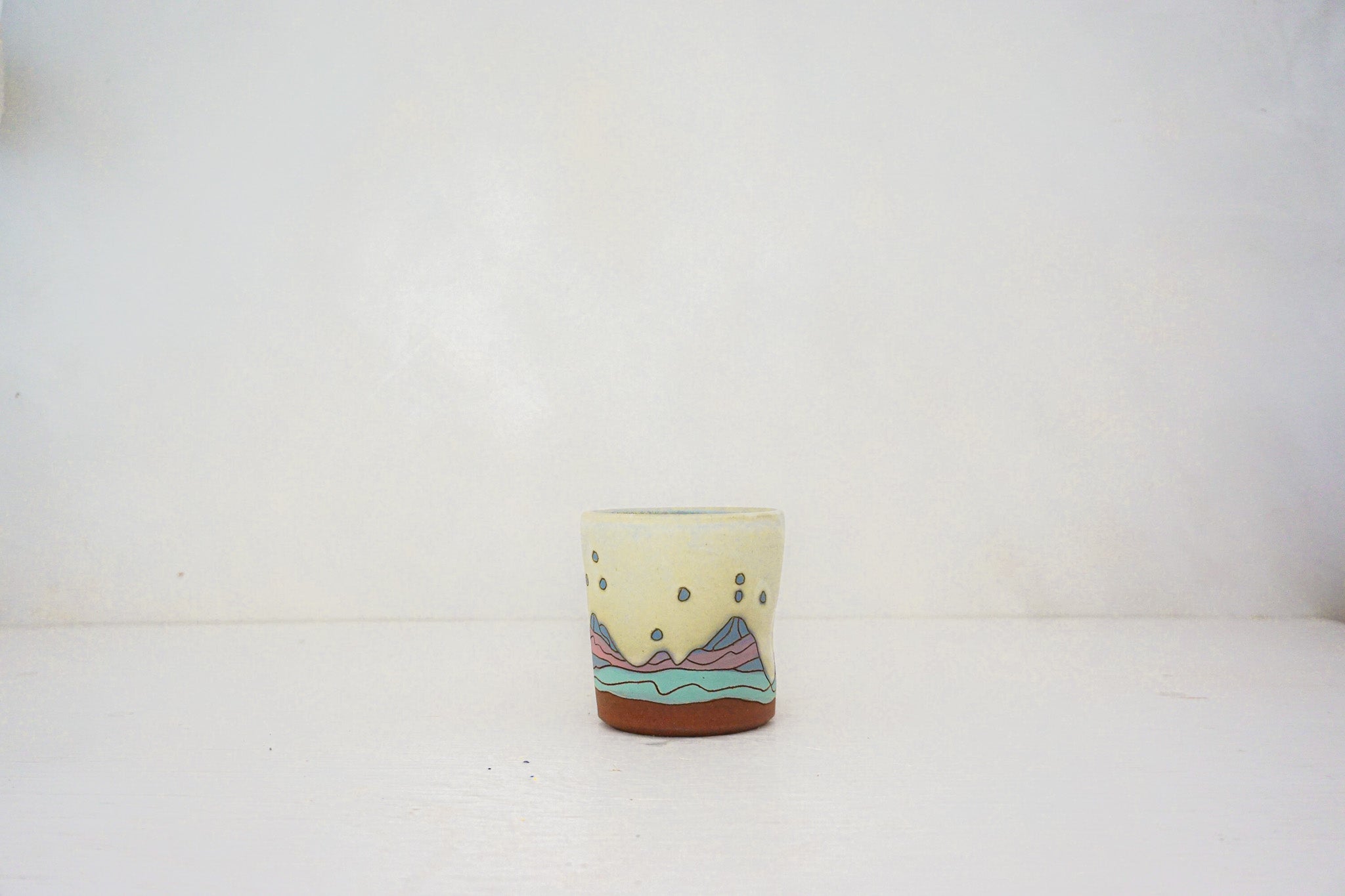 E Teton stars blue cup in BONE