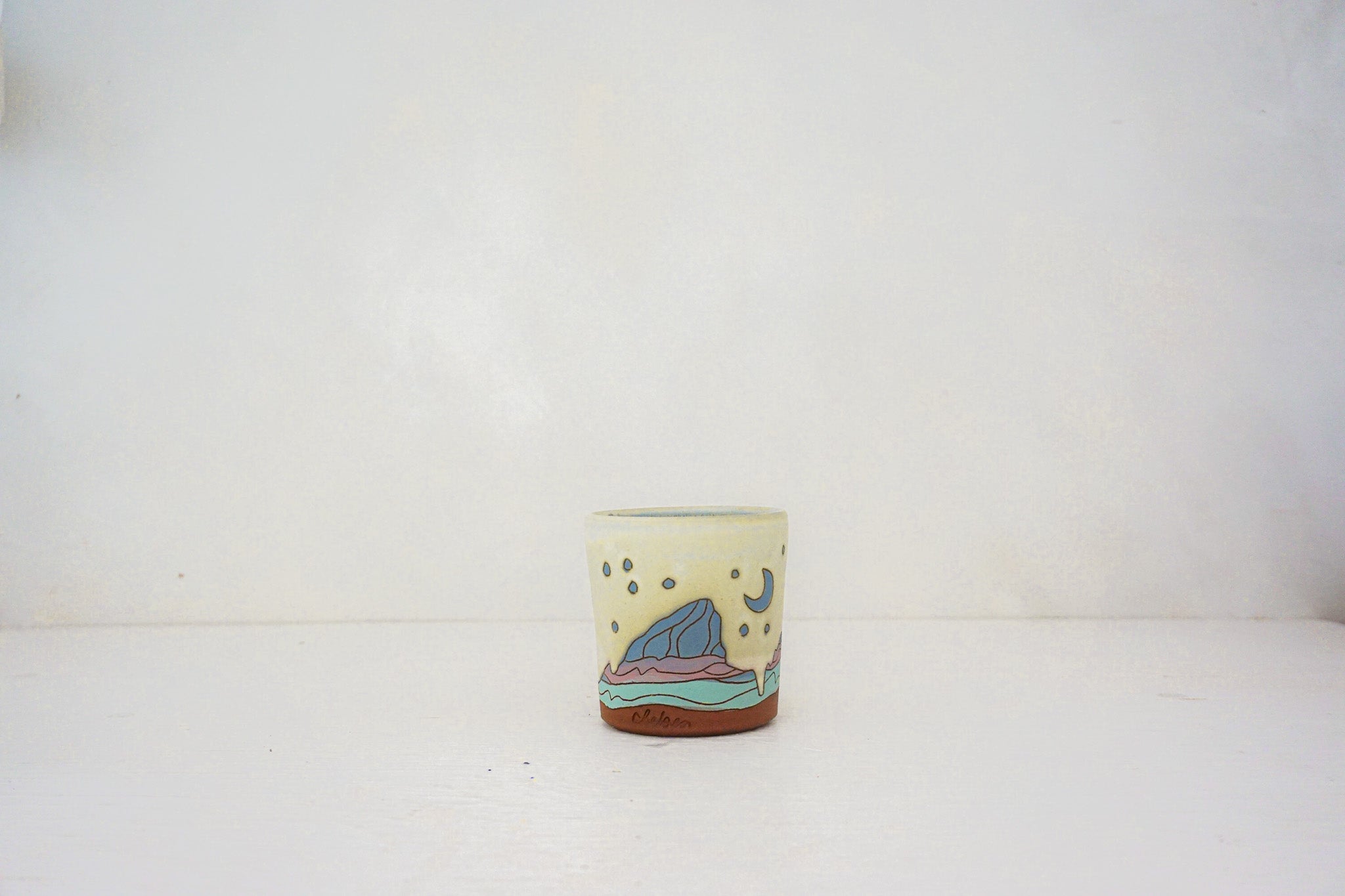 E Teton stars blue cup in BONE