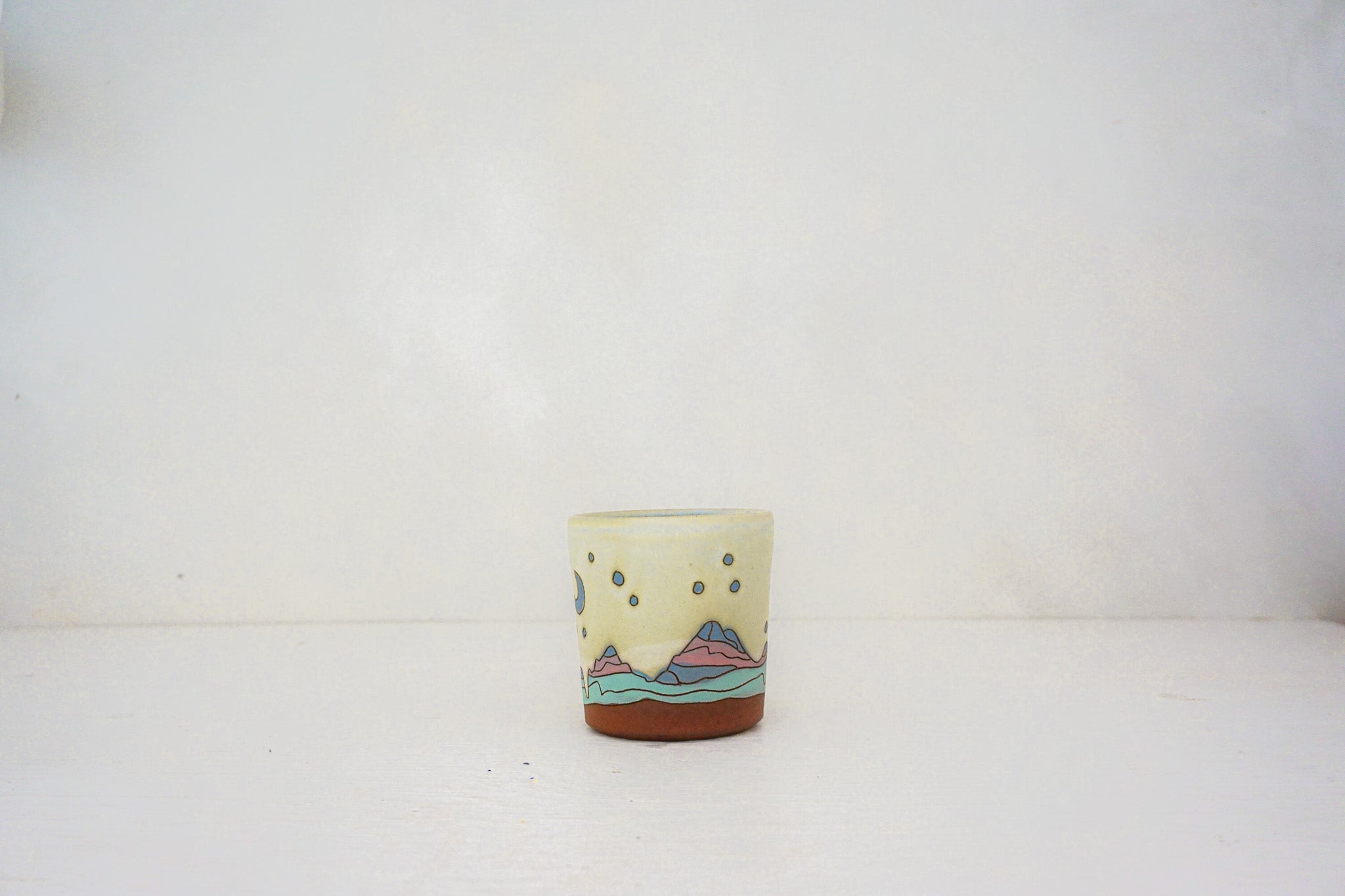 E Teton stars blue cup in BONE