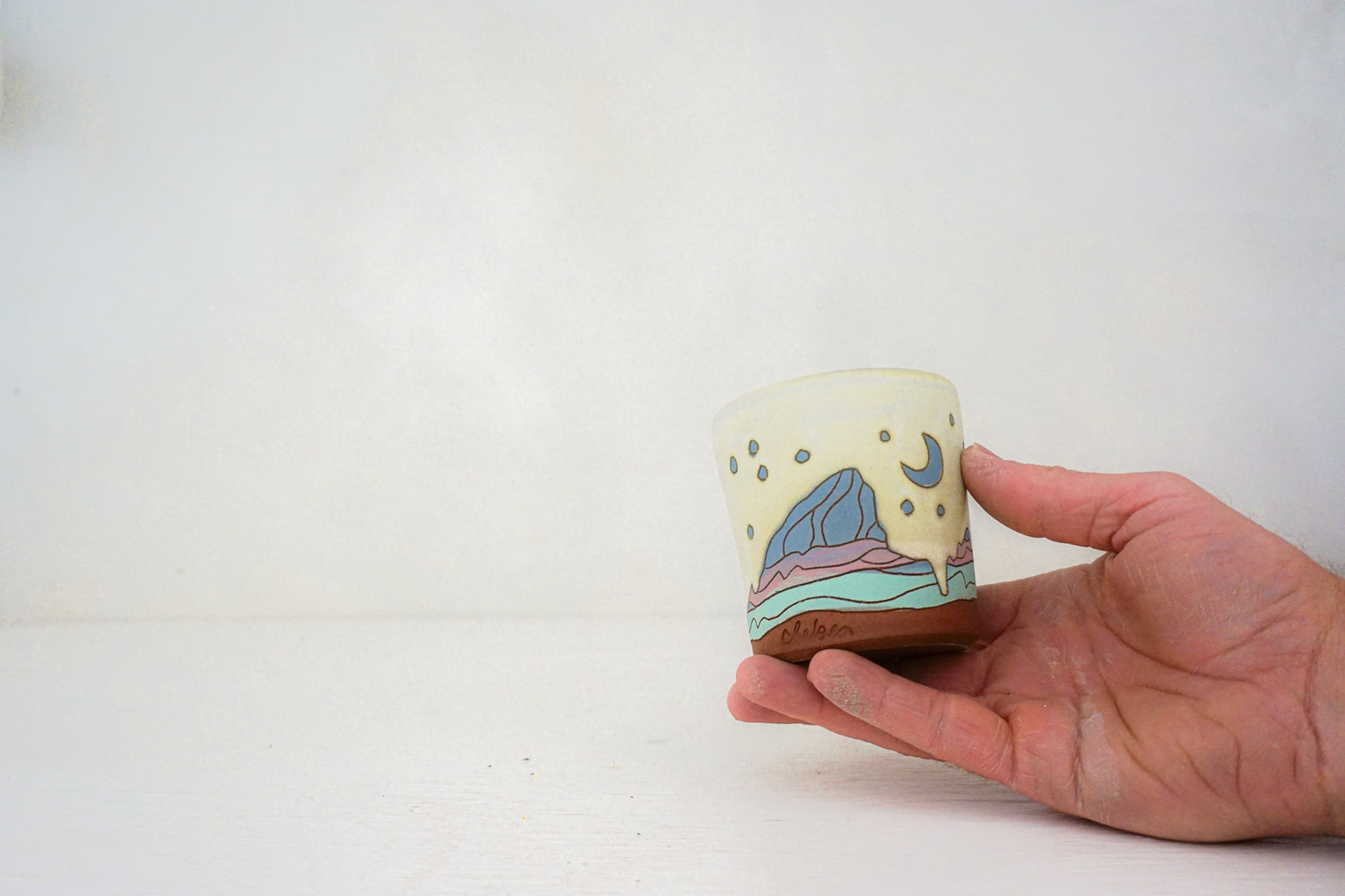 E Teton stars blue cup in BONE