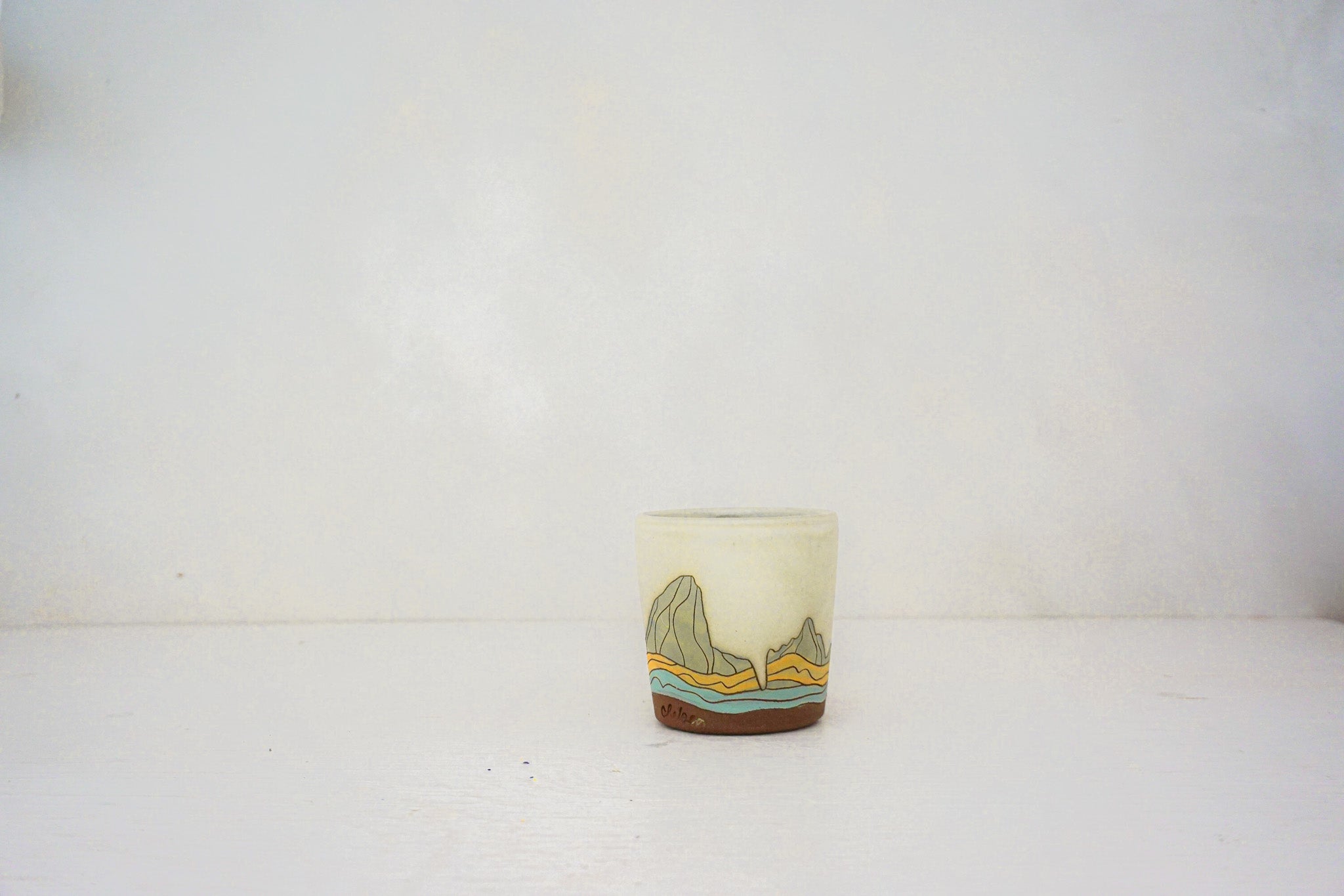 E Teton marble slipped cup in BONE