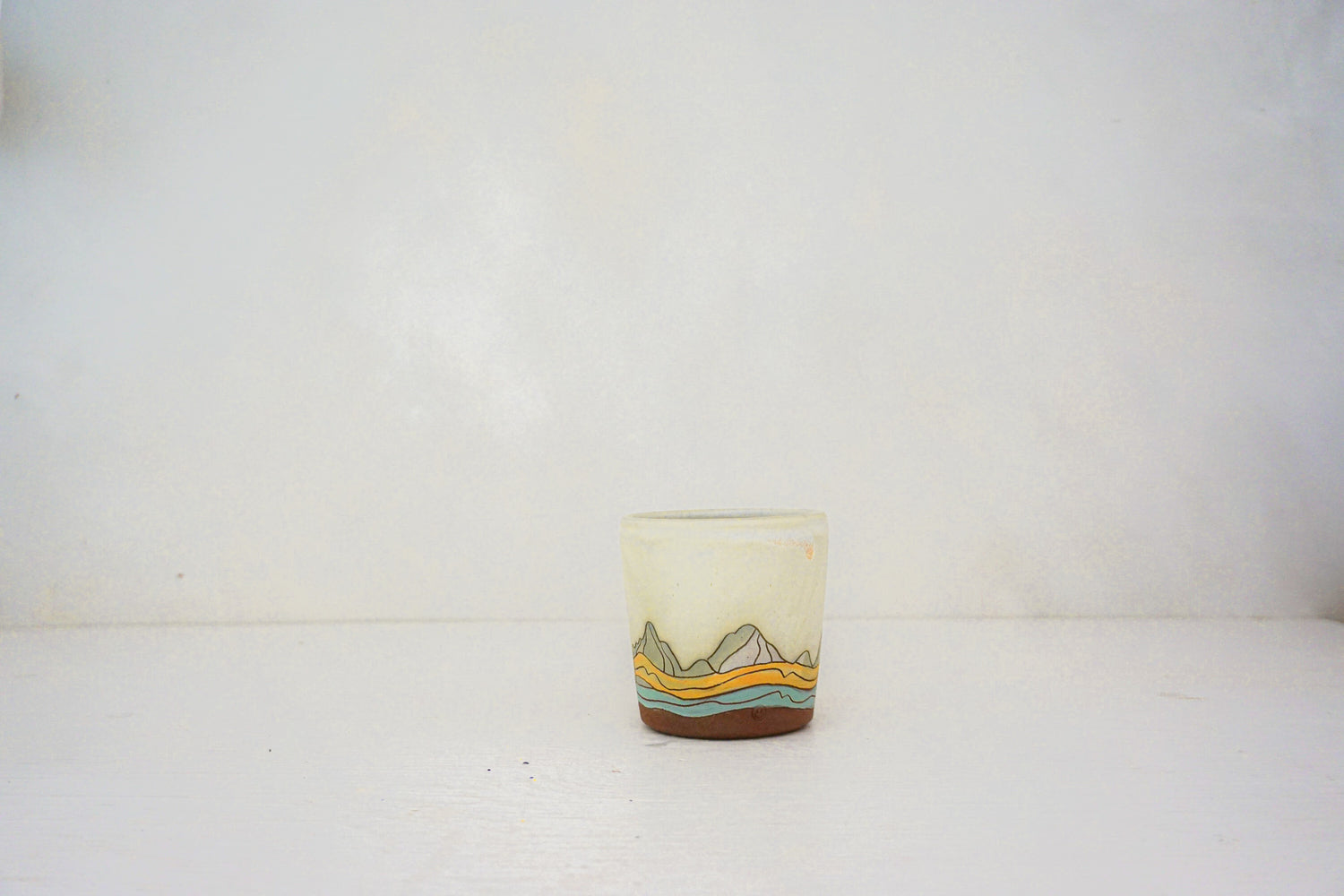 E Teton marble slipped cup in BONE