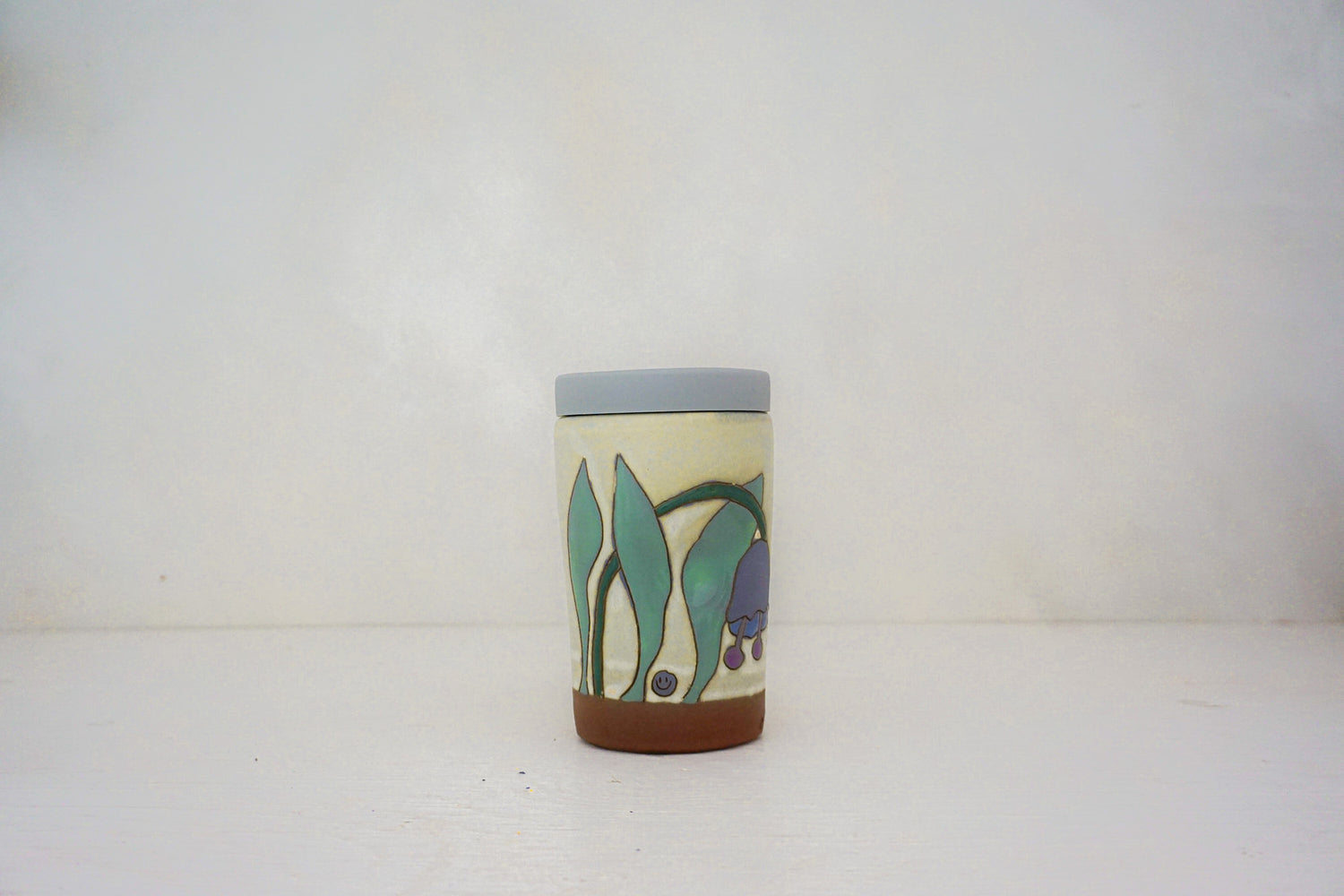 Keep your chin up Purple flower Travel cup in BONE