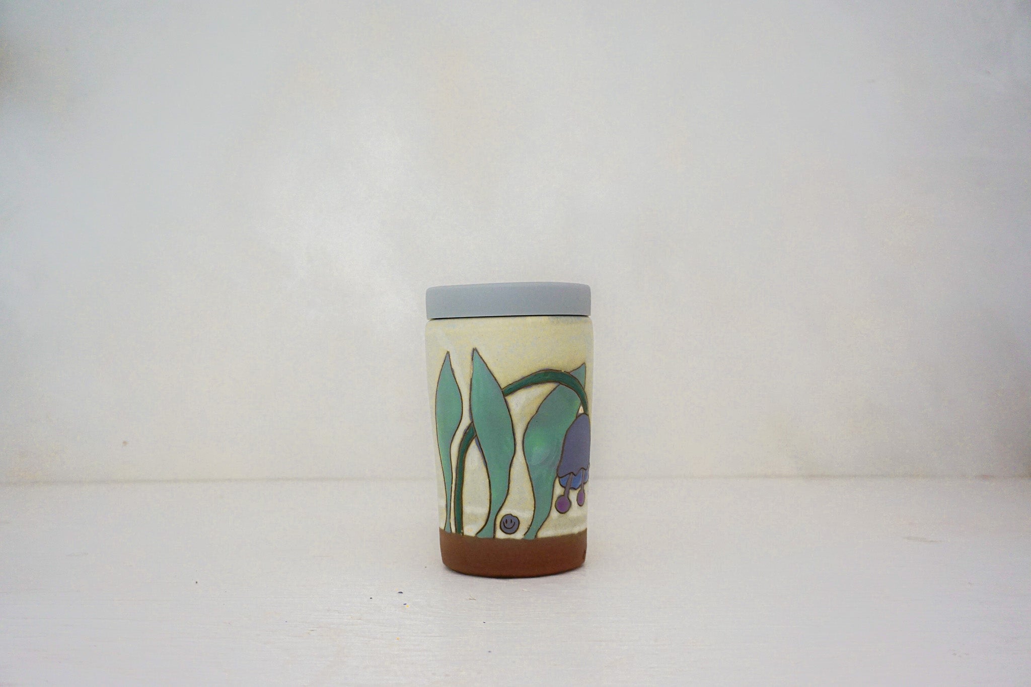 Keep your chin up Purple flower Travel cup in BONE