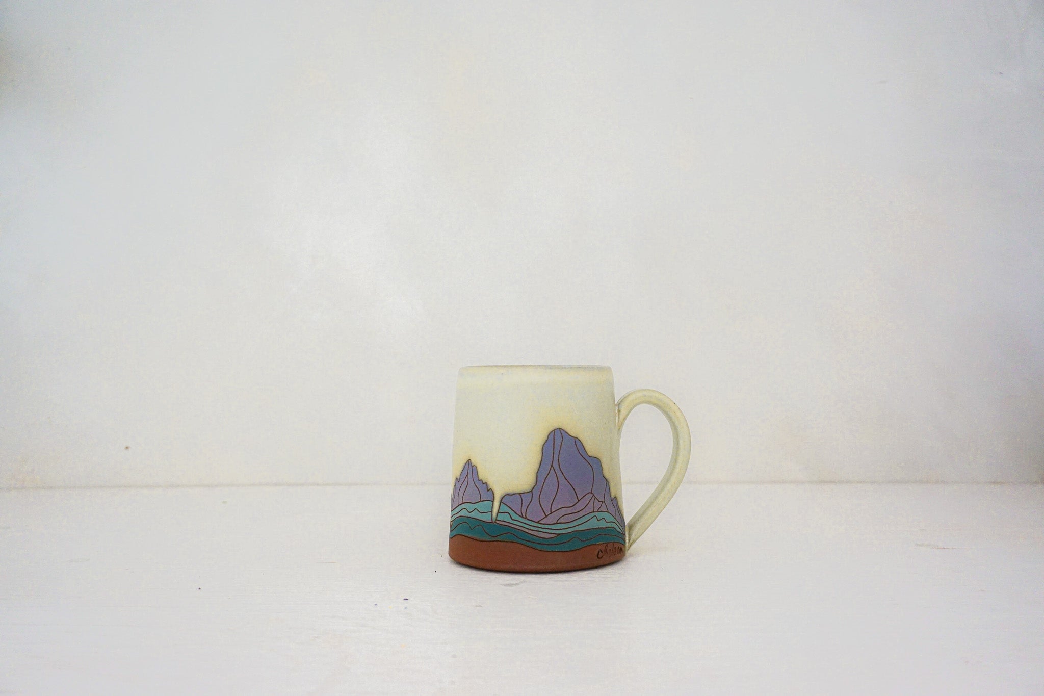 W Teton purple mtn mug in BONE