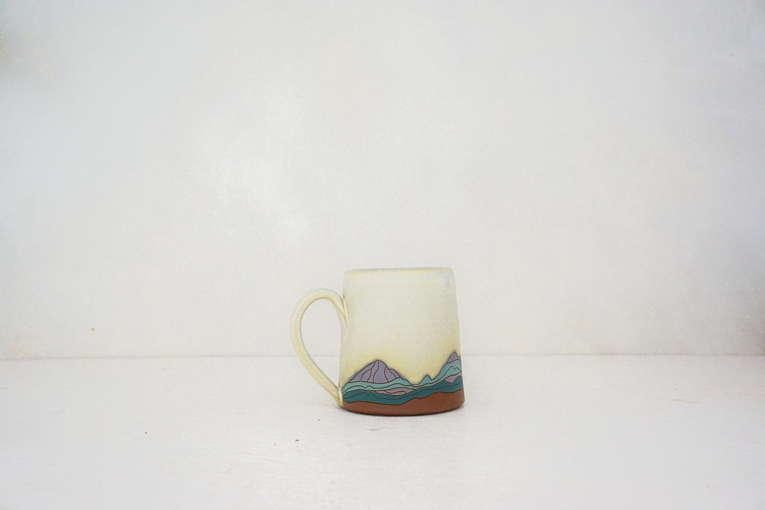 W Teton purple mtn mug in BONE