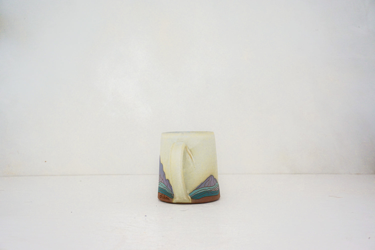 W Teton purple mtn mug in BONE