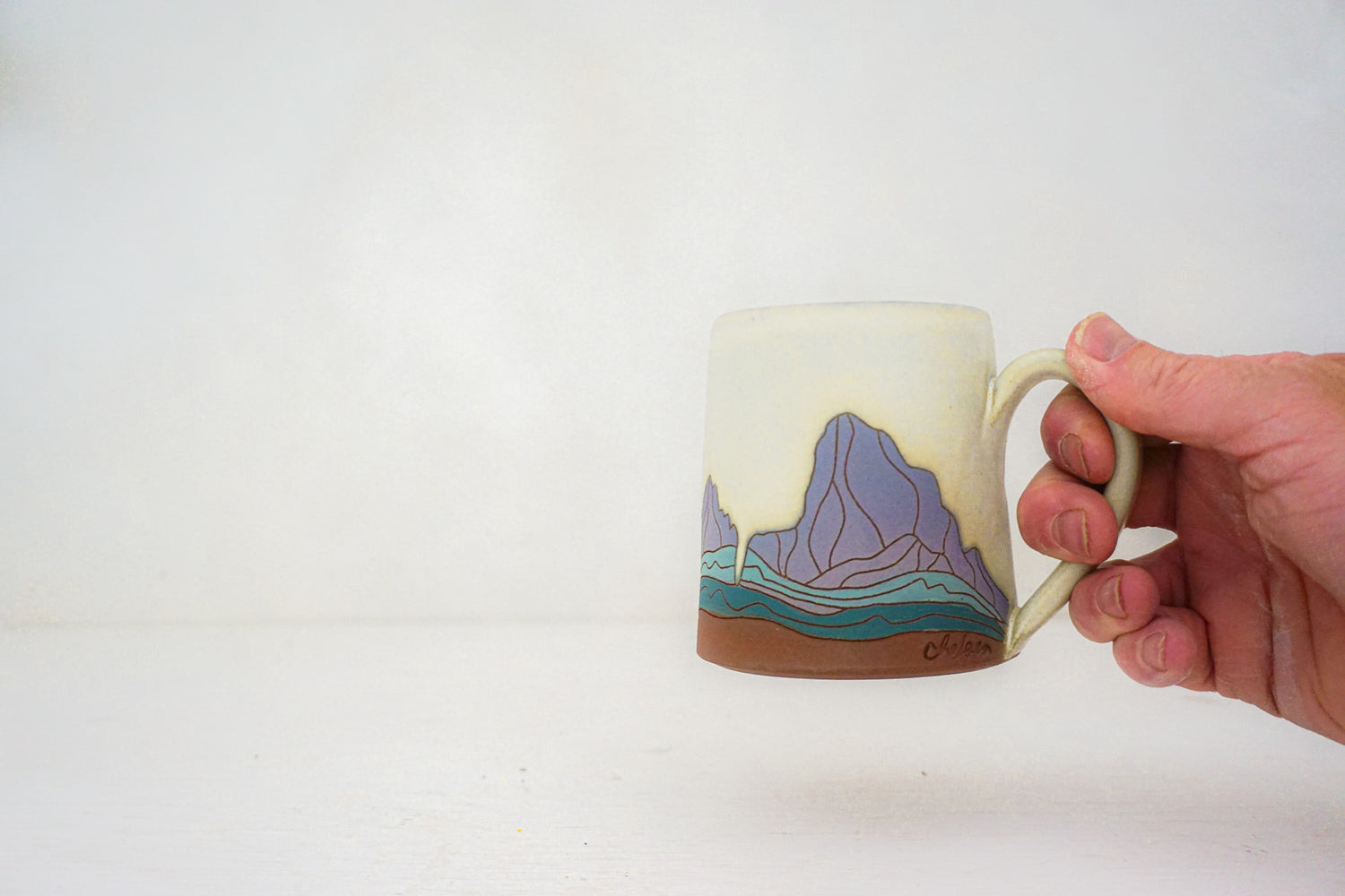 W Teton purple mtn mug in BONE