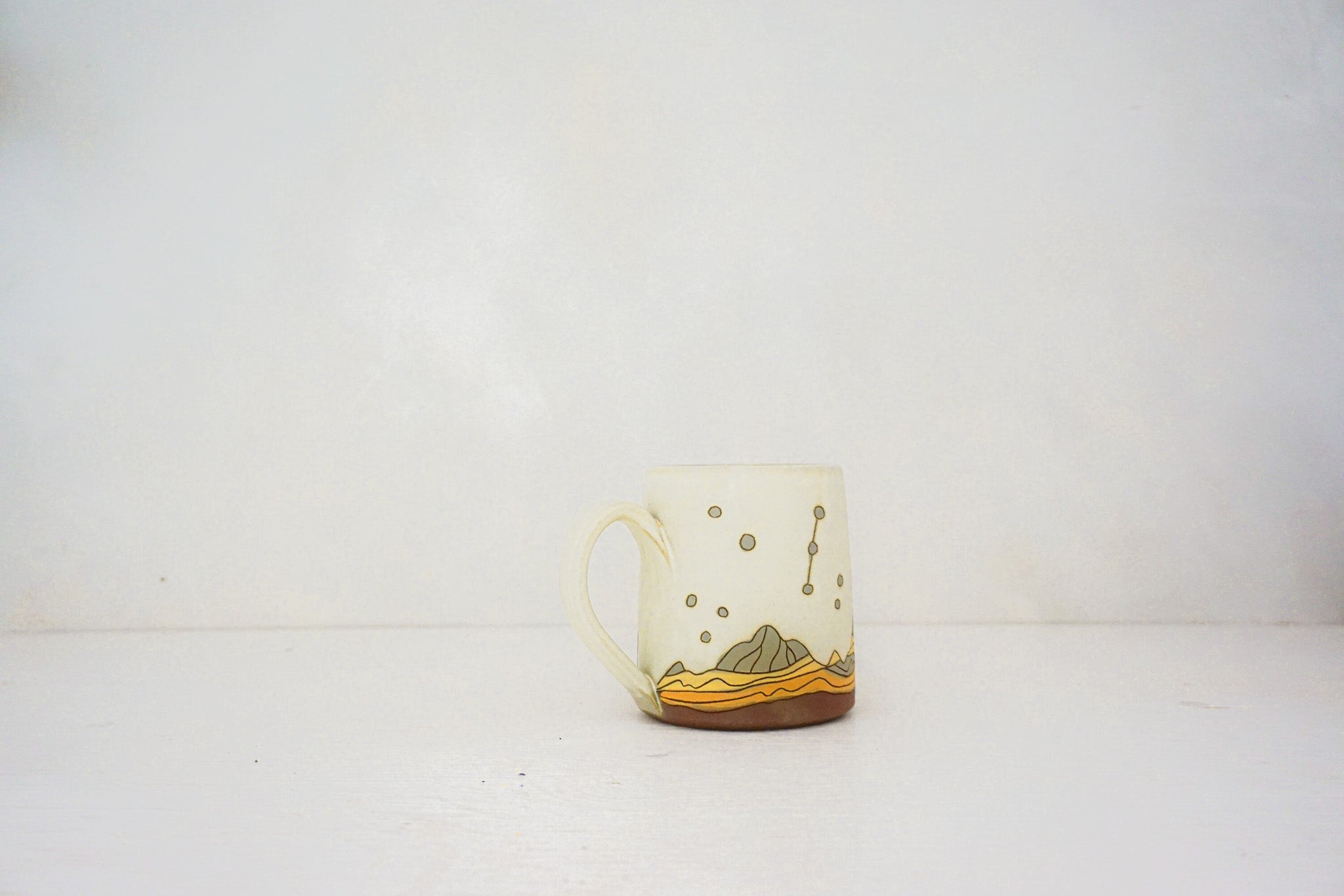 E Teton stars mug in BONE