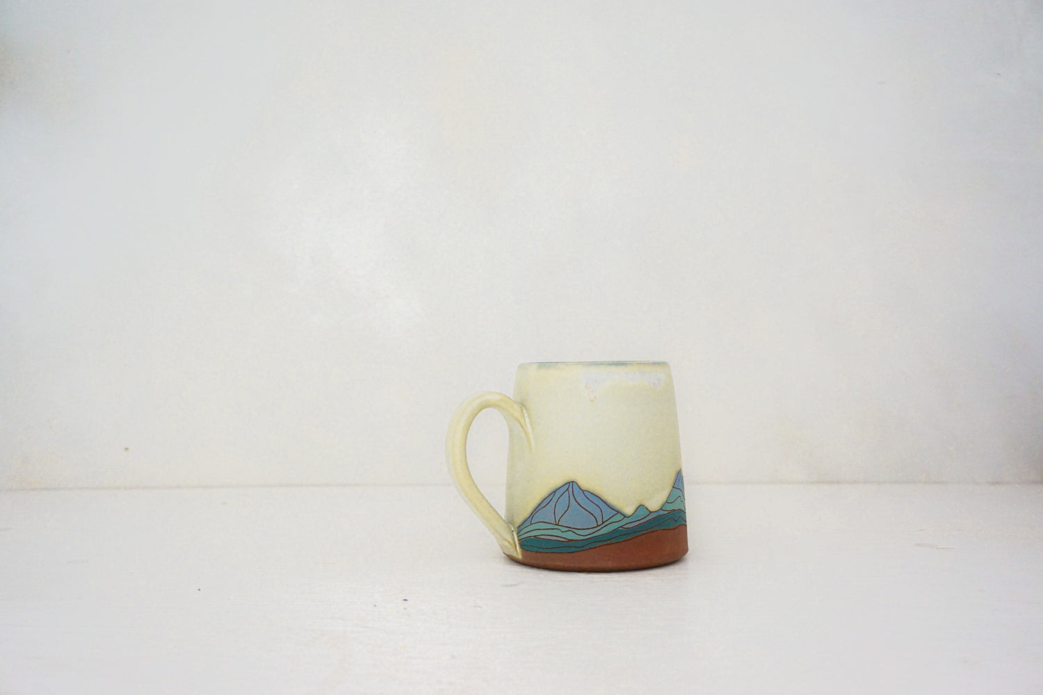 W Teton blue mug in BONE 2