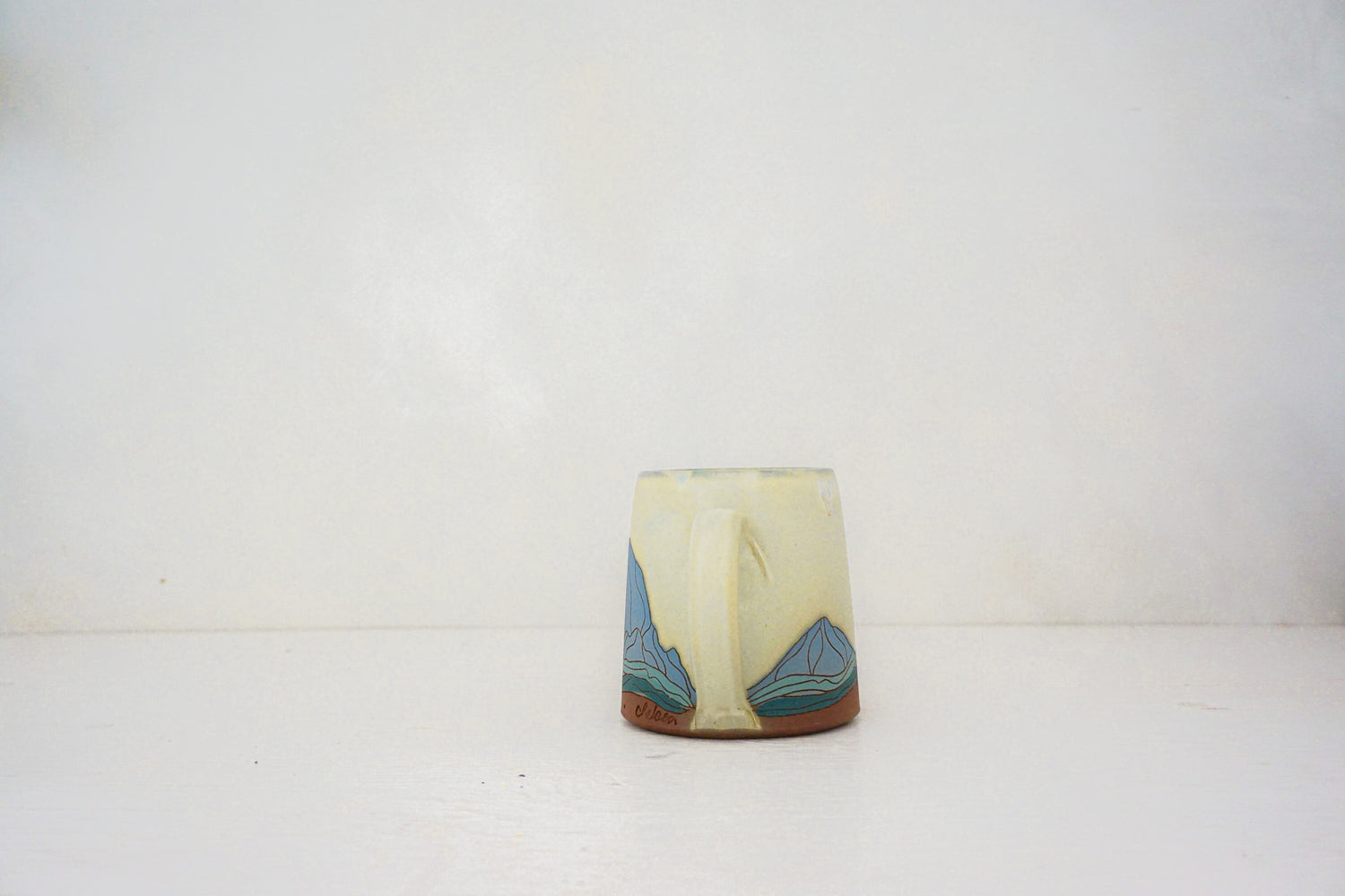 W Teton blue mug in BONE 2
