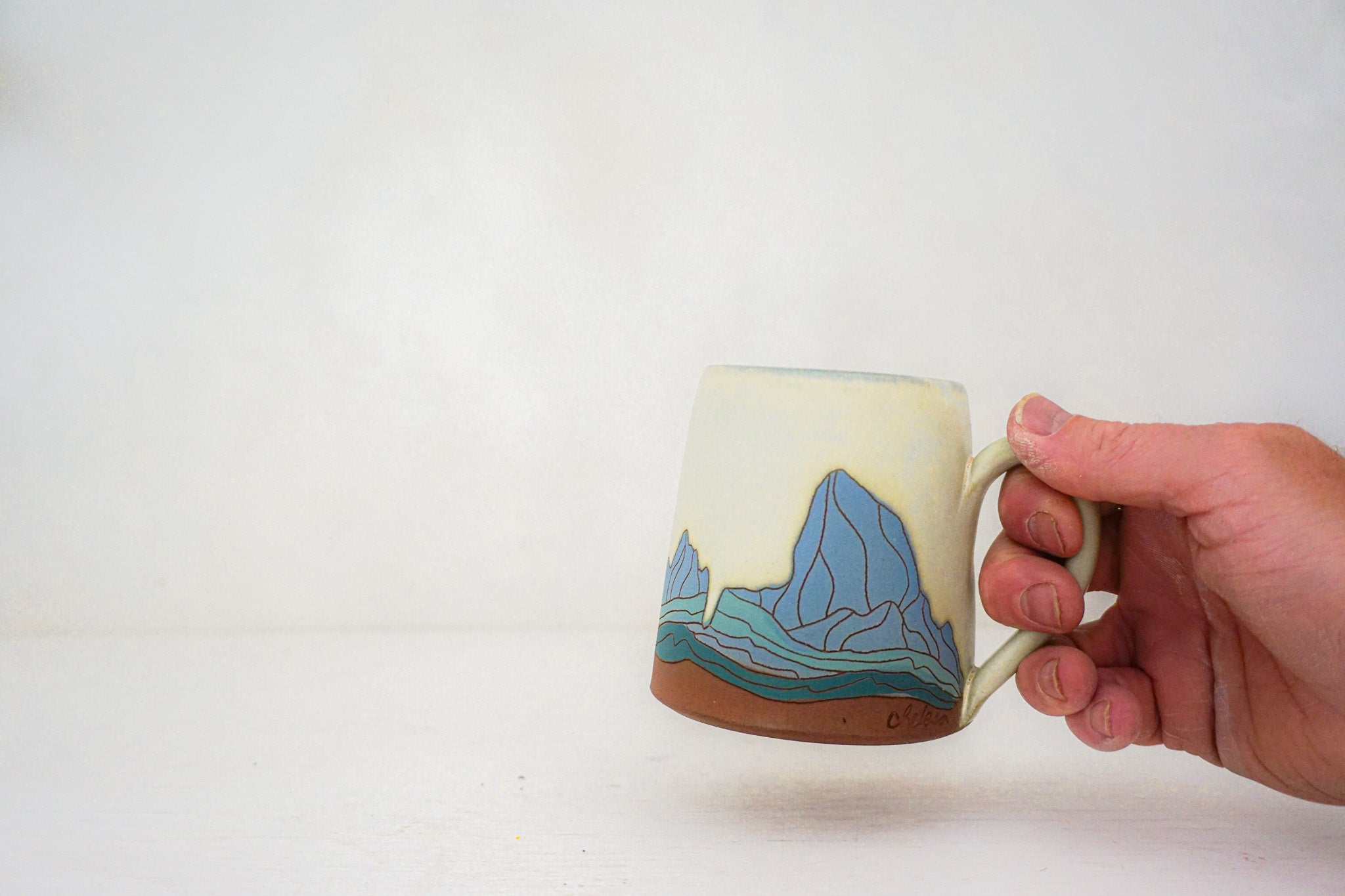 W Teton blue mug in BONE 2