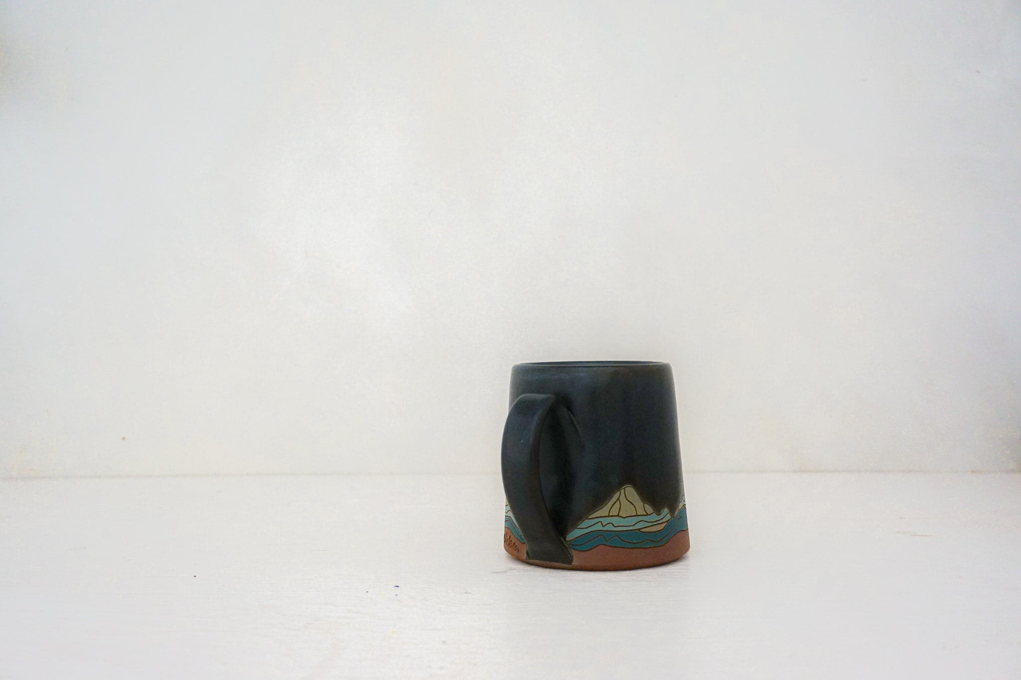 W Teton green mug in DARBY