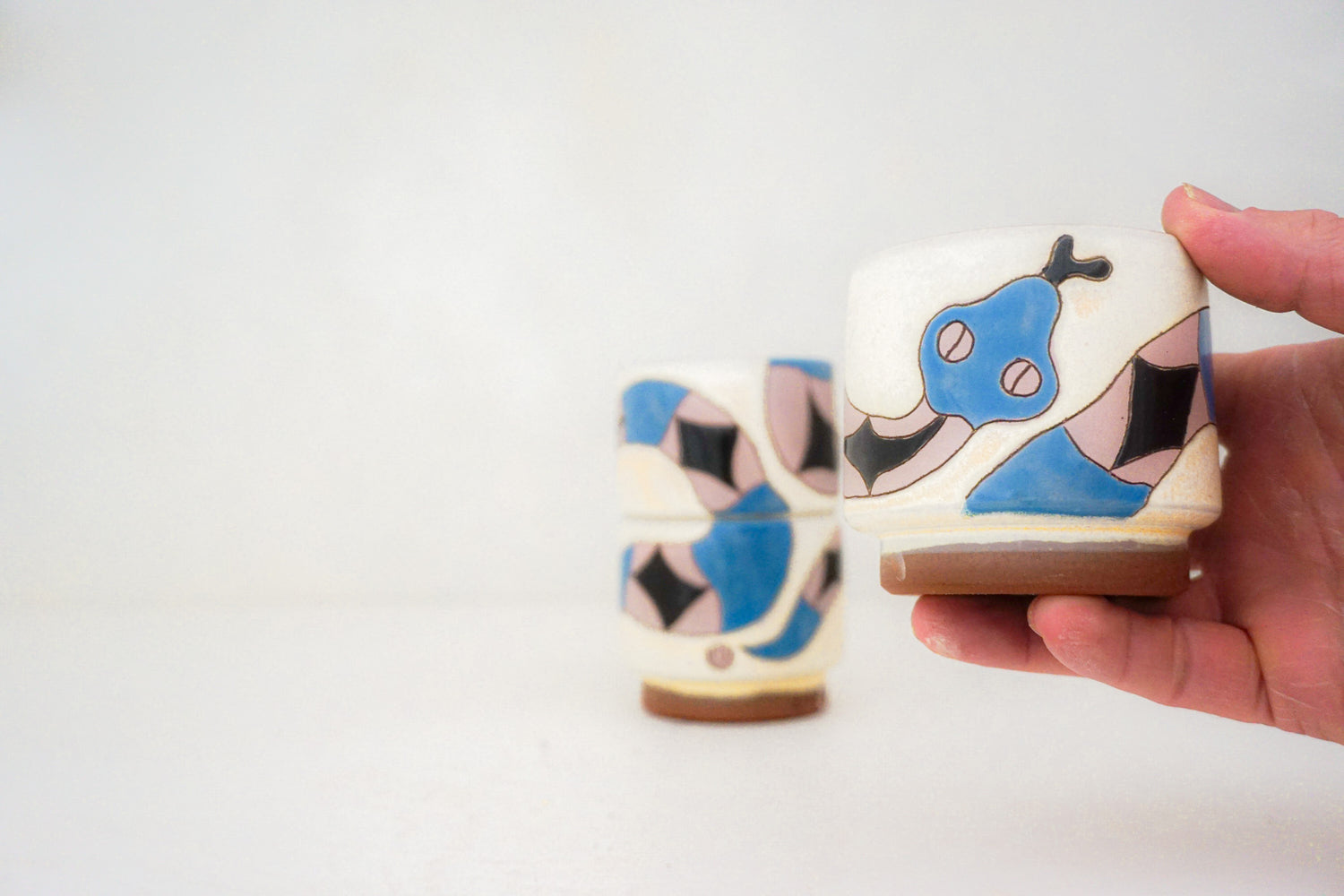 Snake Stackers cups in BONE