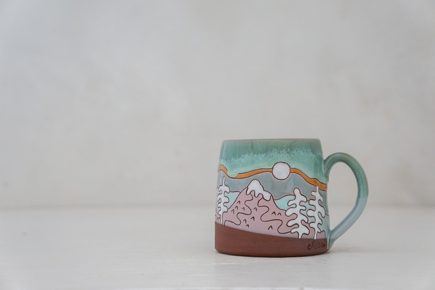 Mtn tree Skylines mug in Ira Blue*