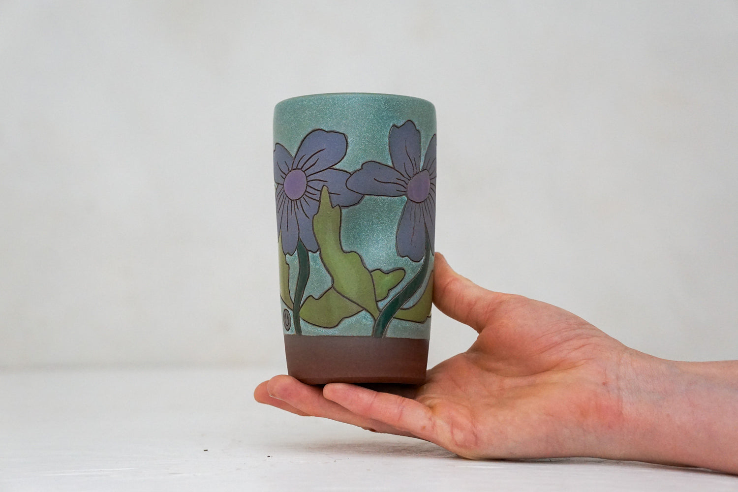 Happy Purple Flowers cup in Lake