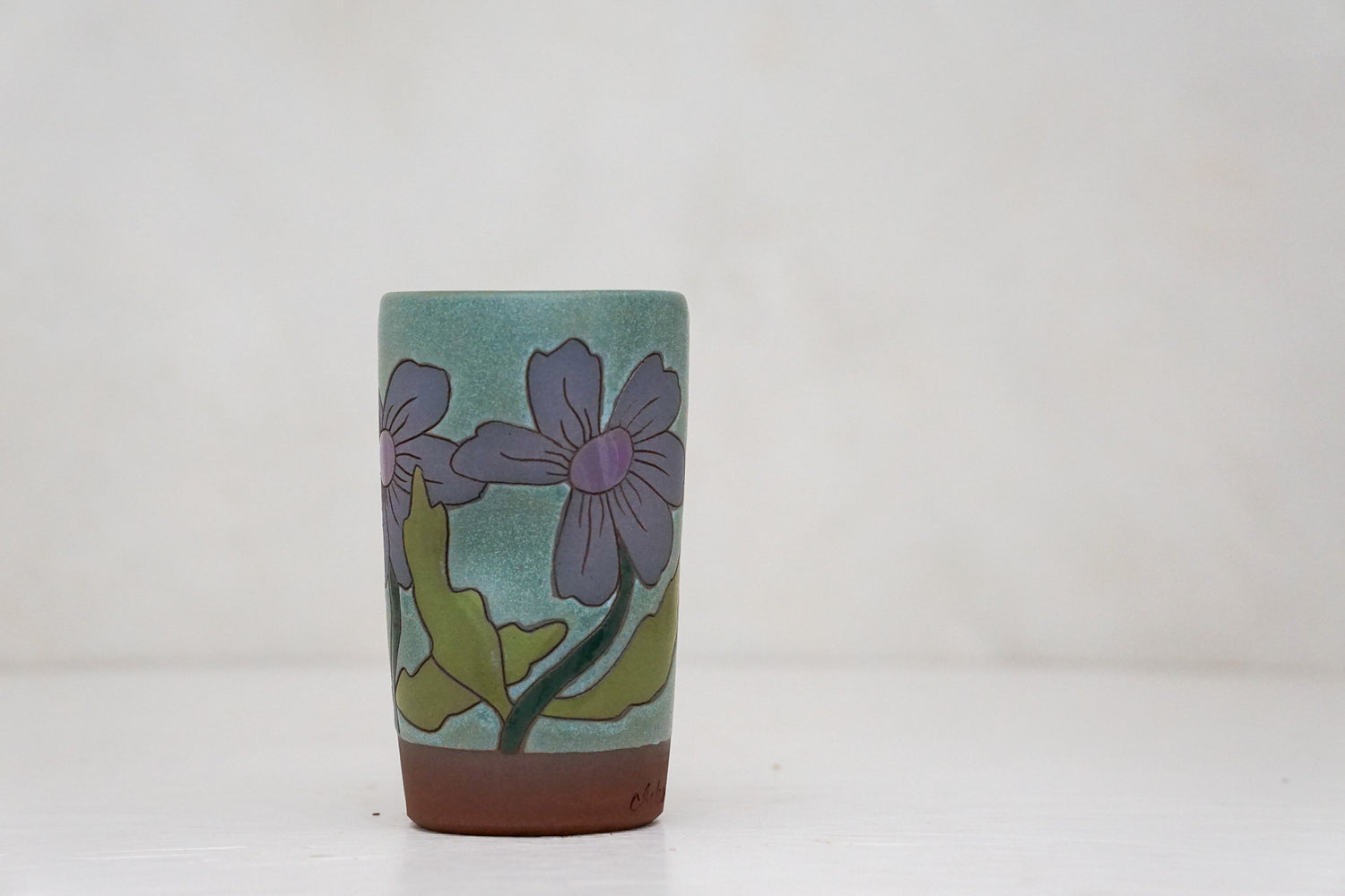 Happy Purple Flowers cup in Lake