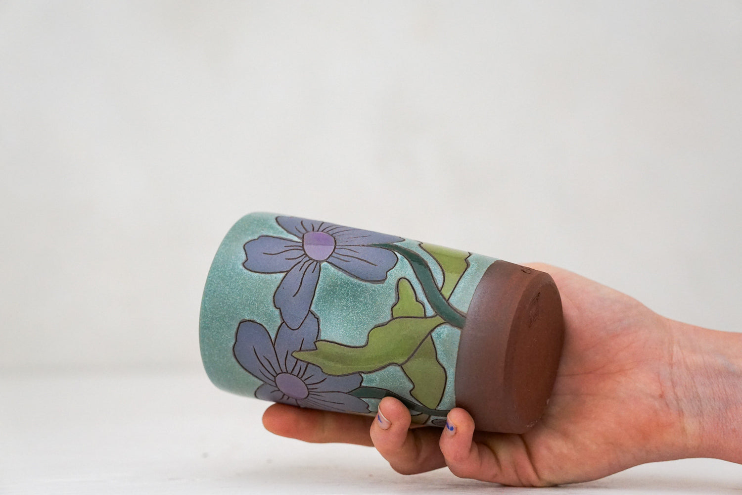Happy Purple Flowers cup in Lake
