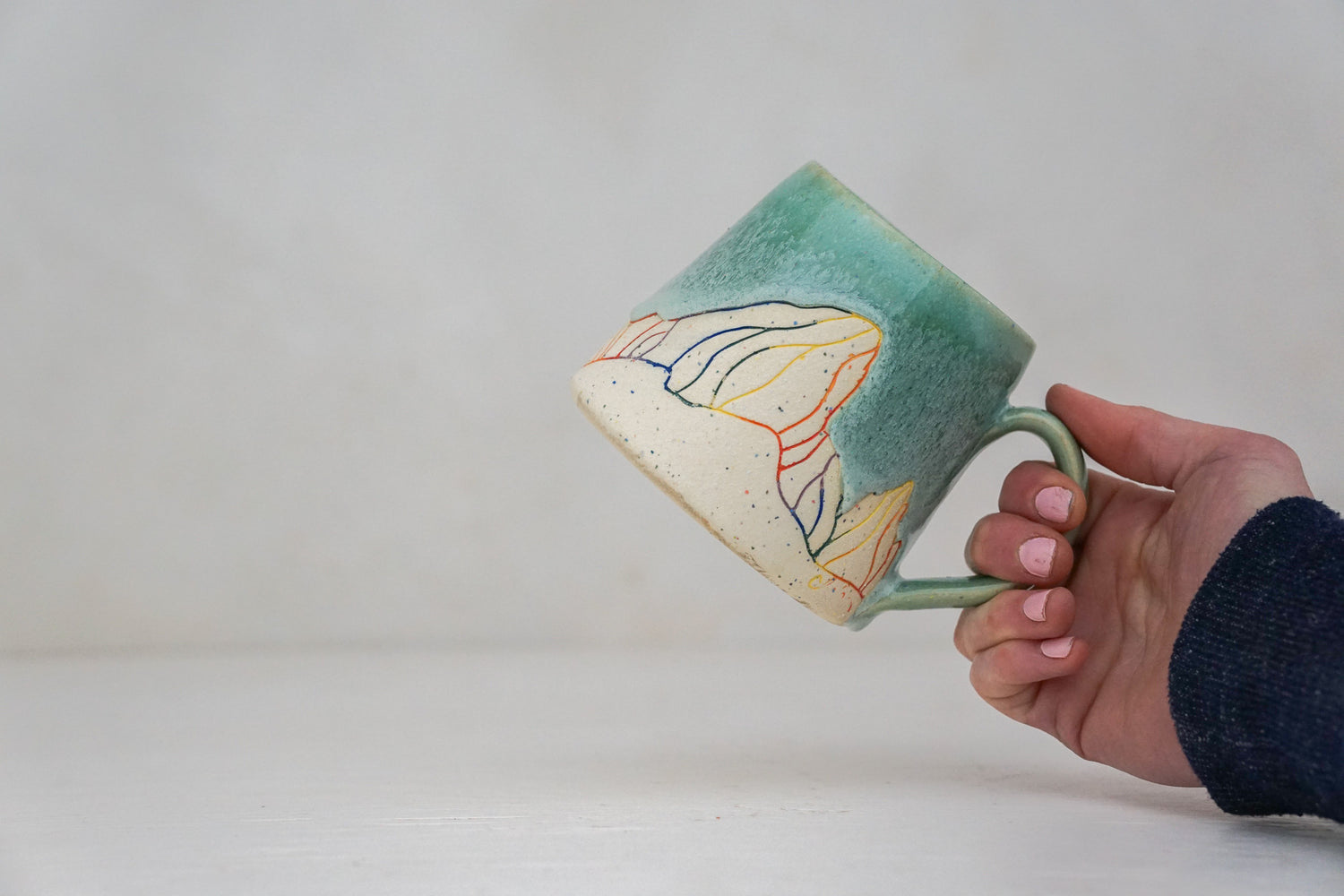 E Teton Colored Grog mug in Ira Magic