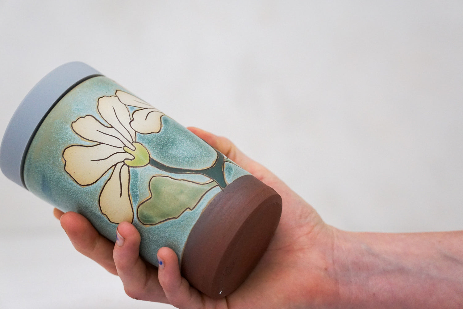Flowers have poweres travel cup in Lake