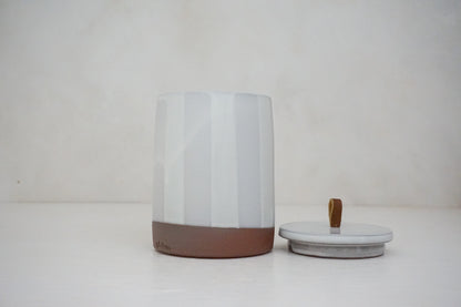 Glossy white glaze stripes on flat white slip Tall jar image 2